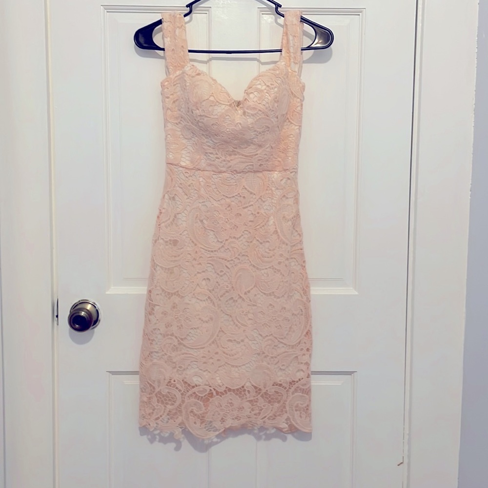 Romantic lace mini dress. Size small. Blush colored. Built in padding.